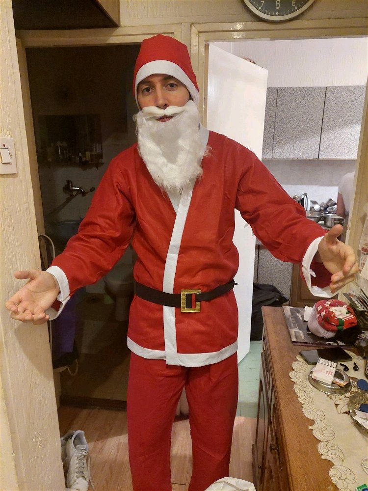 Bought a Santa costume to surprise my nephew and niece with gifts, how's my fit?