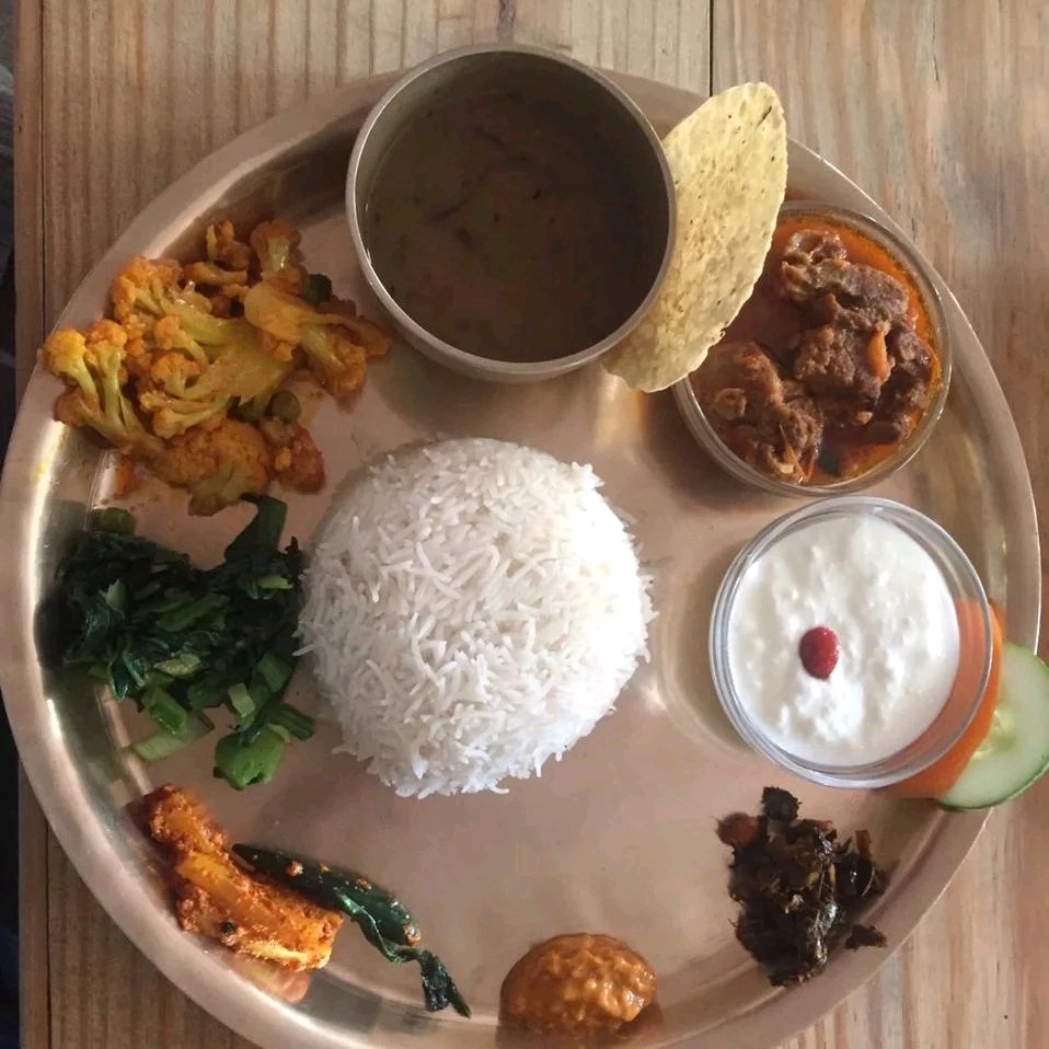 Nepali Thali Set ( Daal, Green vegetable, meat, pickle, rice and curd)