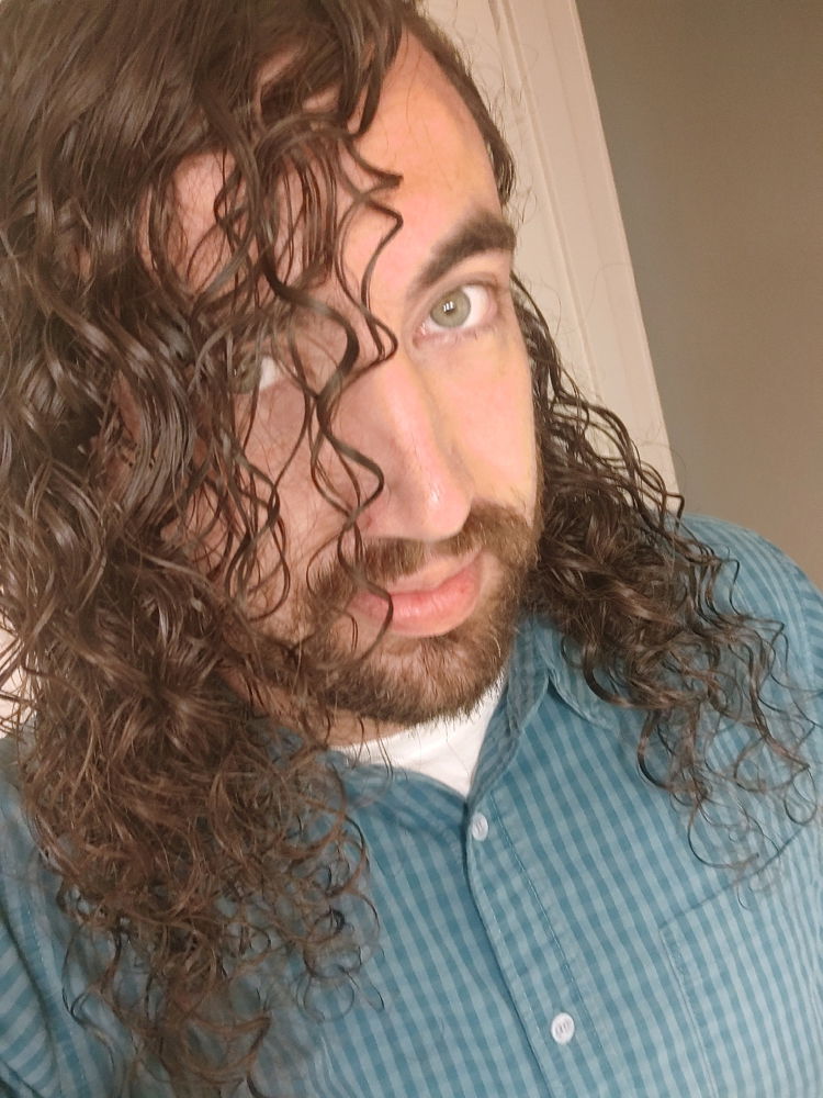 When your hair hasn't dried yet, but you can tell it's a good day for the curls.