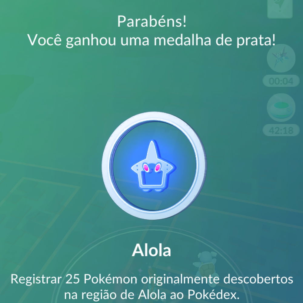 Ganhei minha medalha prata de pegar pokémons de Alola.