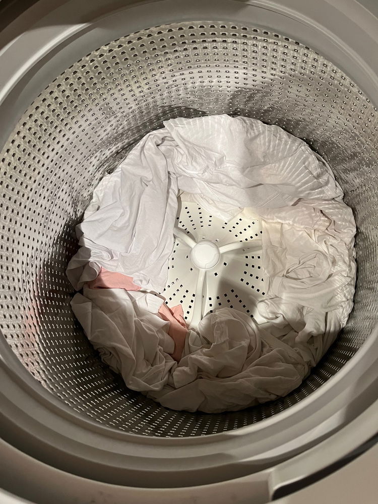 I’m doing a small load of whites with my pastel pink Lady Gaga shirt 👚 it’s been washed about 100 times so there’s no chance the dyes will bleed onto the whites. I’m only using OxiClean and Attitude gentle fabric softener and cool wash, cold rinse to save electricity