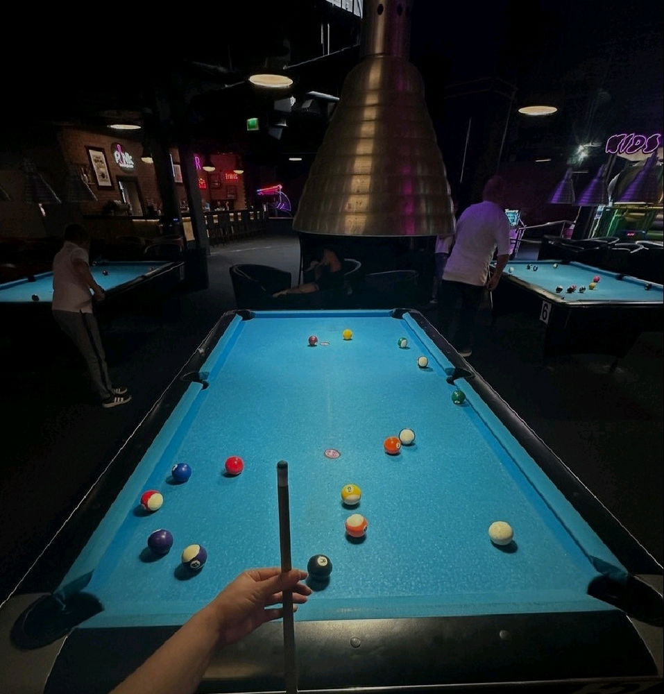 Cue in hand, ready to dominate the table 😉