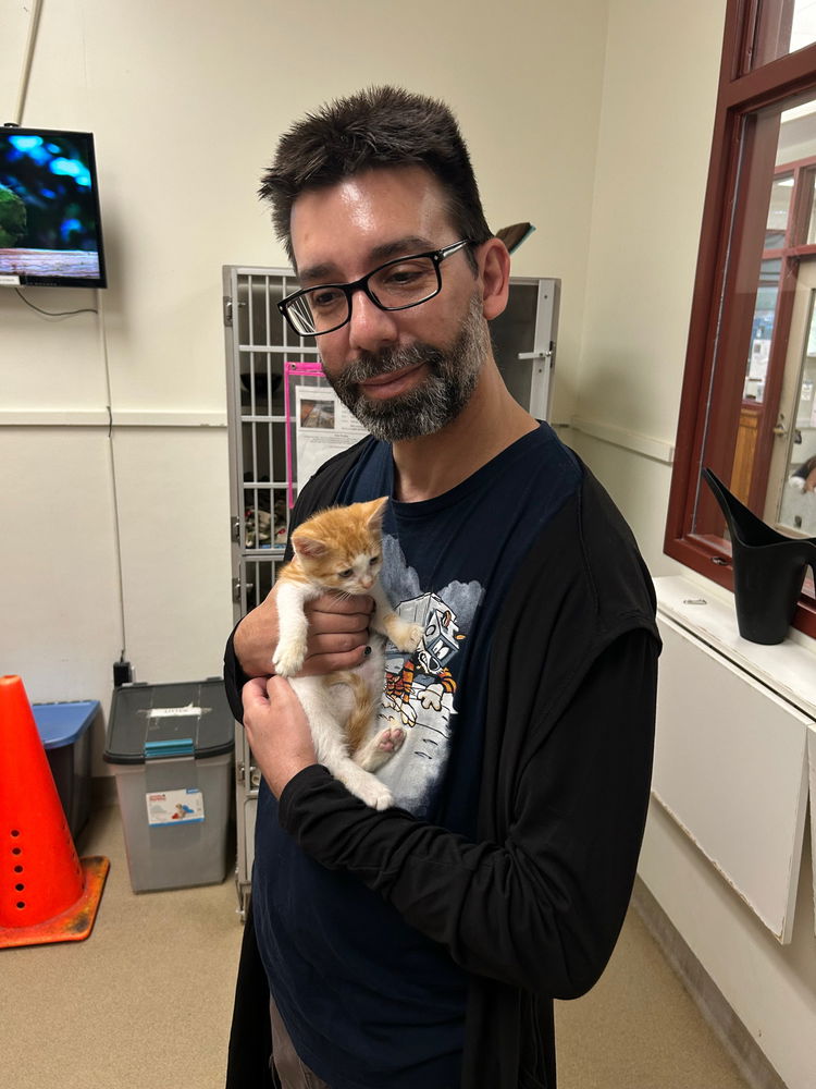 And here’s my dad Cary holding a kitten named Tigre 