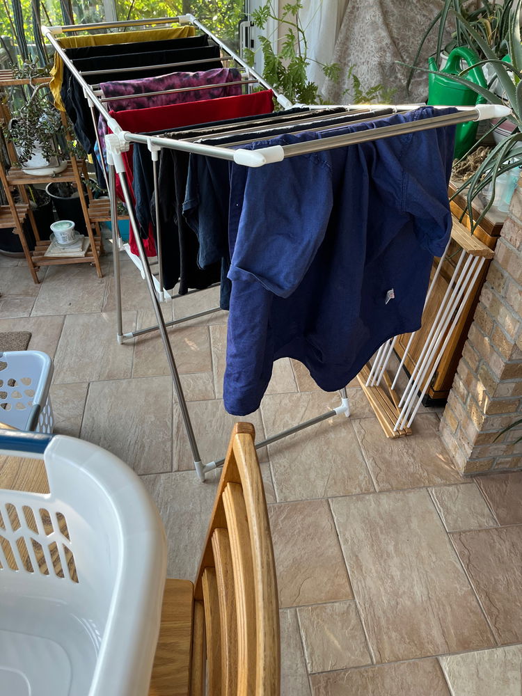 I’m using a drying rack in our veranda to save electricity 💪 the pants are still drying on the clothesline