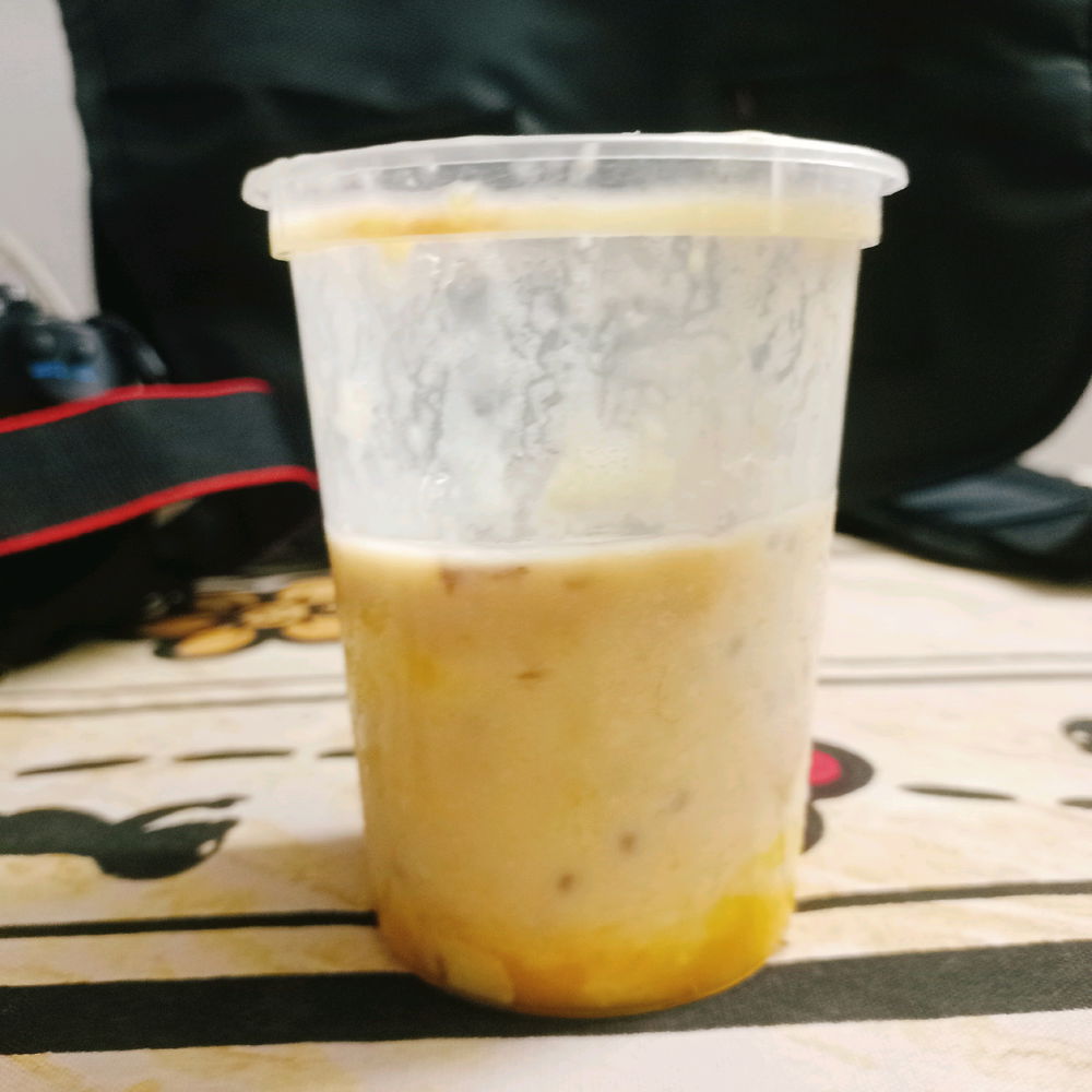 Mango 🥭 smoothie 🥤 with chocolate Syrup 😋