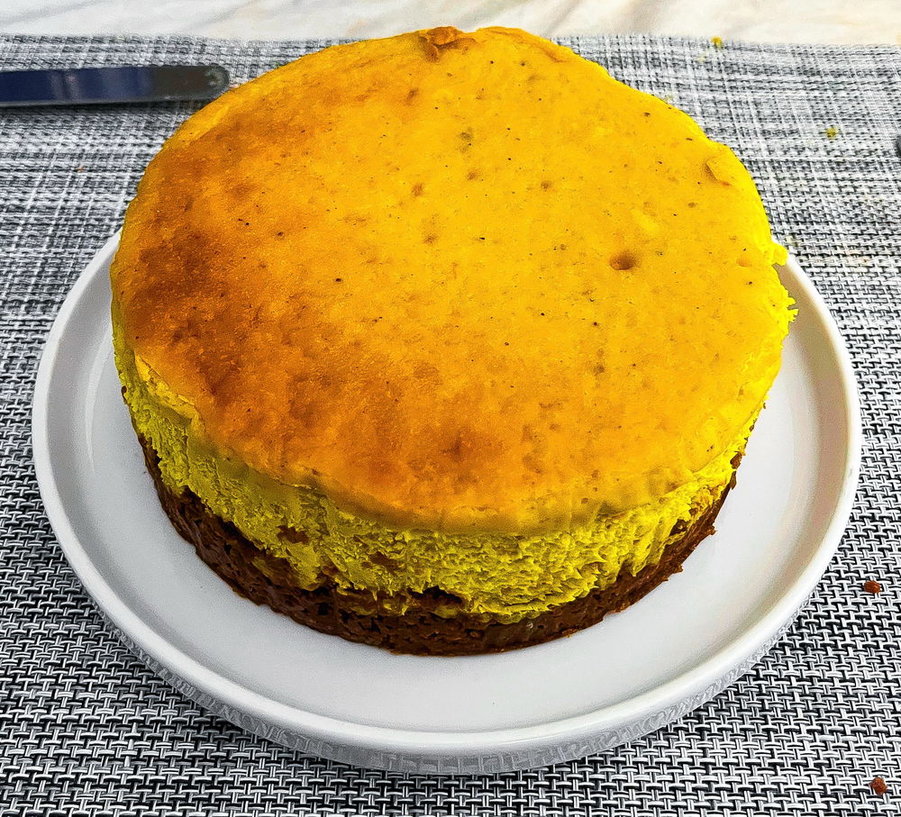 Homemade chai and orange New York style cheesecake
