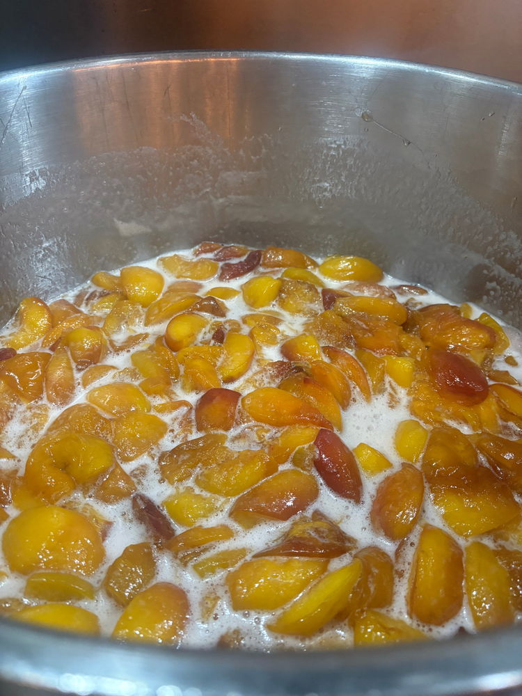 Making a big batch of peach jam