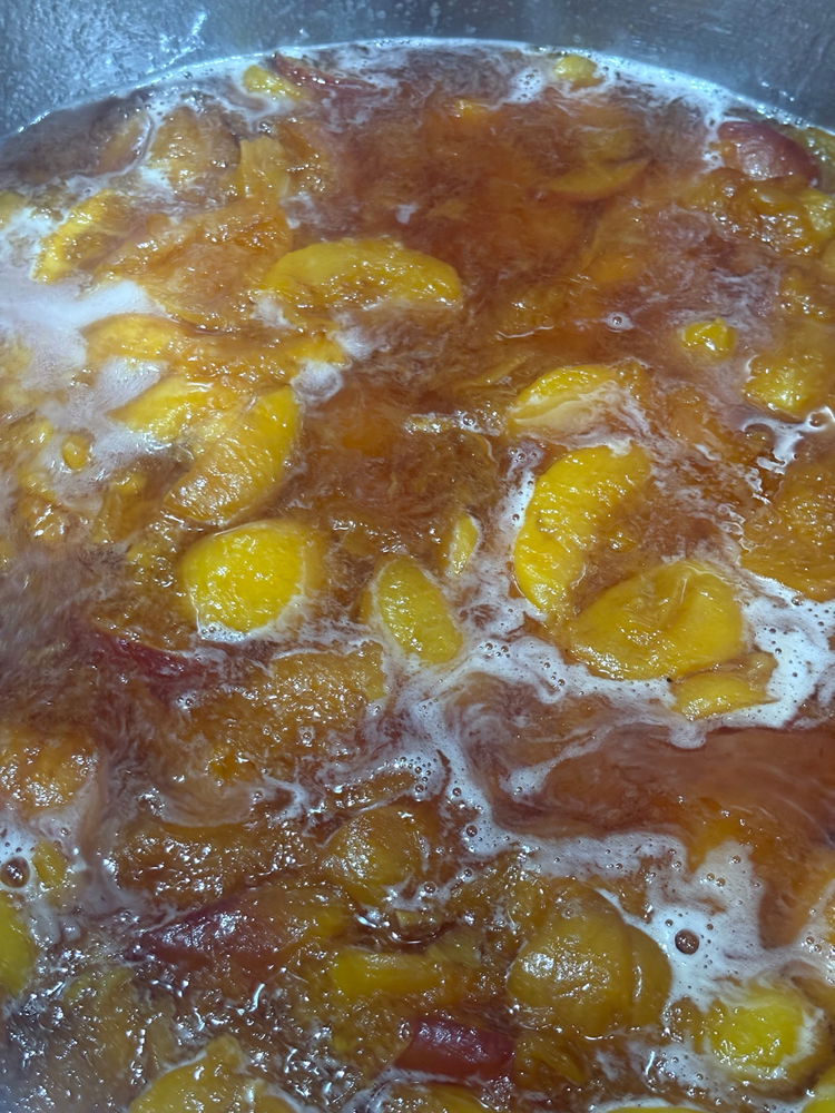 Making a big batch of peach jam