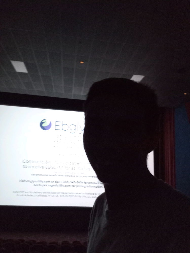 At the movie watching a horror movie