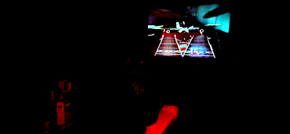 Van + projector + guitar hero