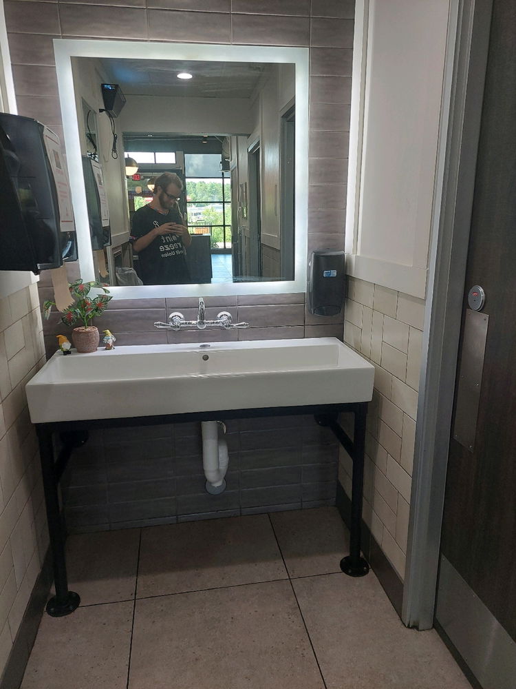 Sink outside of the restrooms