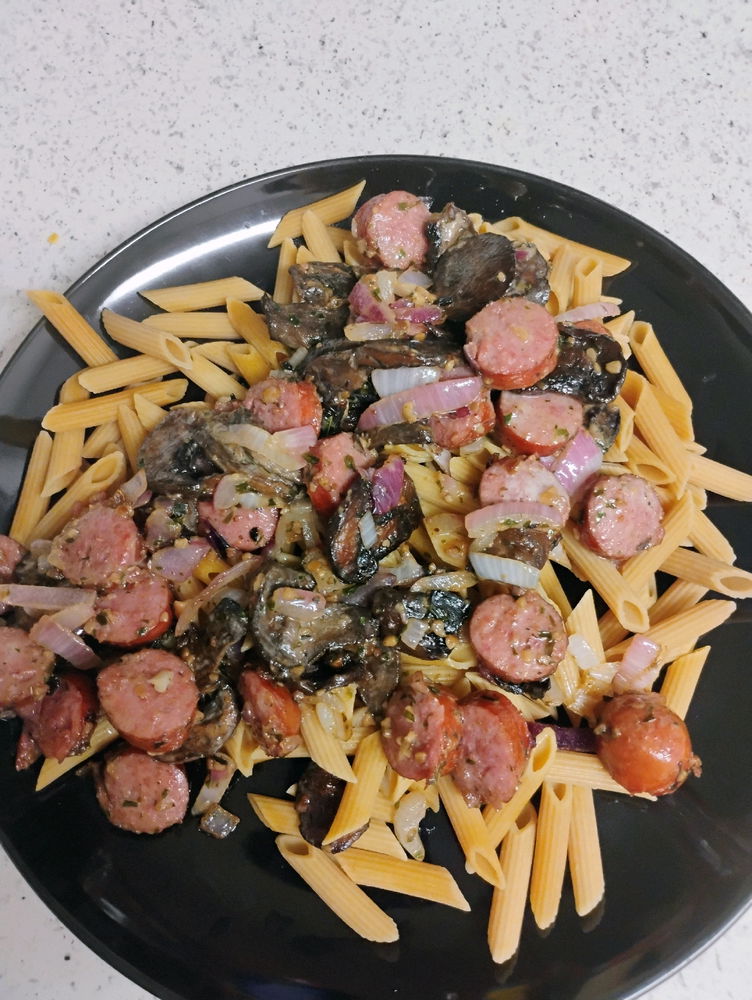 I made this dish about a couple of weeks ago. It has garlic, sausage, mushrooms, onion, with spices like tarragon, black pepper, salt, and thyme in a garlic butter reduction sauce over pasta. I hope you all like the photo. Feel free to comment. I hope we can chat further.