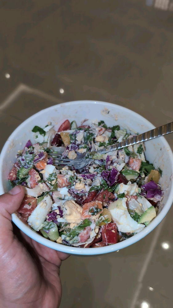 Healthy salad with eggs and special healthy dressing